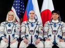 Returning to Earth: (L-R)  Kate Rubins, KG5FYJ; Anatoly Ivanishin, and Takuya Onishi, KF5LKS. [NASA photo]